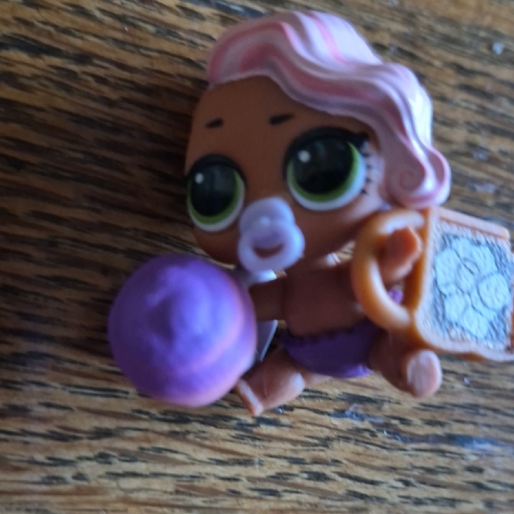 L.O.L. Surprise! Baby Doll with Pink Hair and Purple Outfit